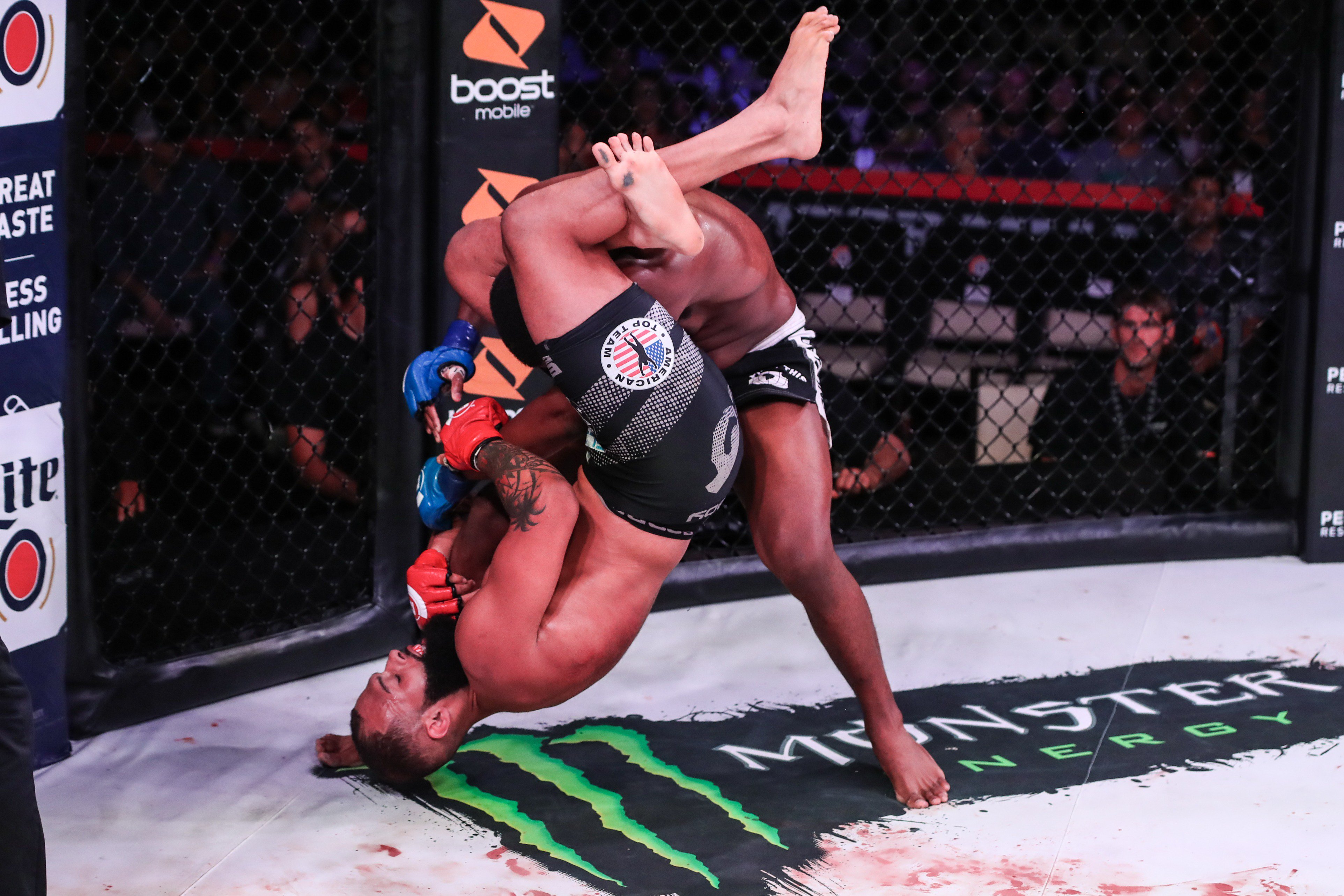 Jordan Young attacks from his back against Joel Bauman (Bellator)