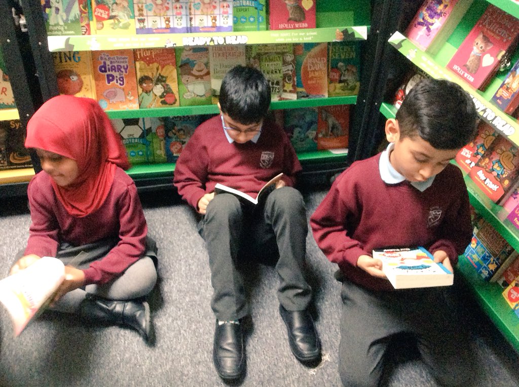 MissChester2's tweet photo. 2C are enjoying their morning in the school library for reading week! We ❤️ to read! #WorldBookDay2019 @somerville_pri https://t.co/ndytOWVL82