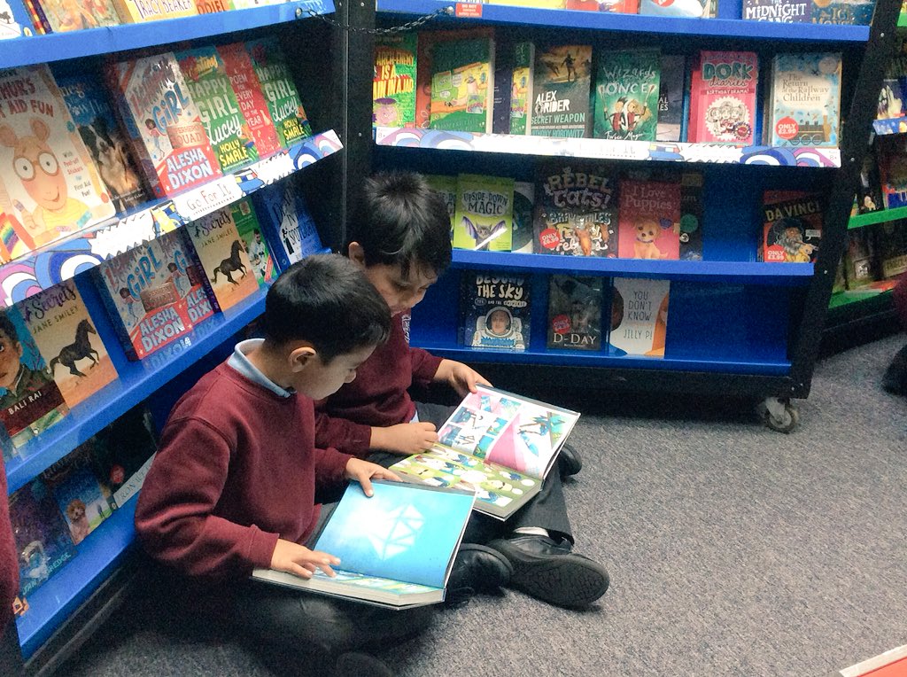 MissChester2's tweet photo. 2C are enjoying their morning in the school library for reading week! We ❤️ to read! #WorldBookDay2019 @somerville_pri https://t.co/ndytOWVL82