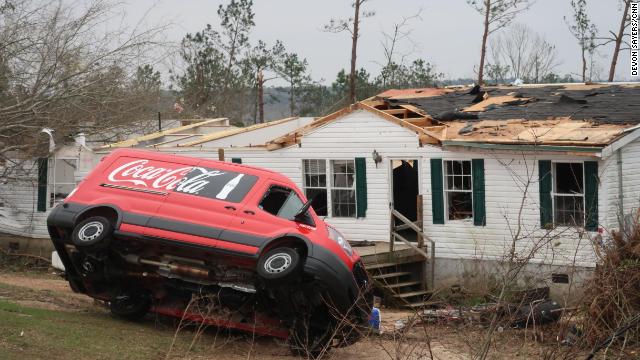 cnnbrk's tweet photo. A coroner warns that more than a dozen people may be missing after back-to-back tornadoes leave at least 23 dead in Alabama. Follow updates: https://t.co/wf3DxB8xiL https://t.co/npaYMMFtA6