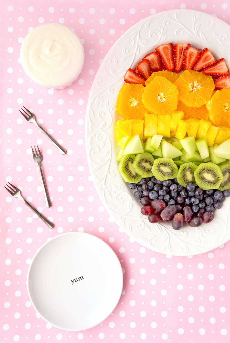 How much fun is the rainbow fruit tray with orange honey Greek yogurt dip? Perfect healthy snack or appetizer for feeding a crowd! Get the recipe here: hauteandhealthyliving.com/recipe-box/rai… #HealthyFood #snacks #appetizers