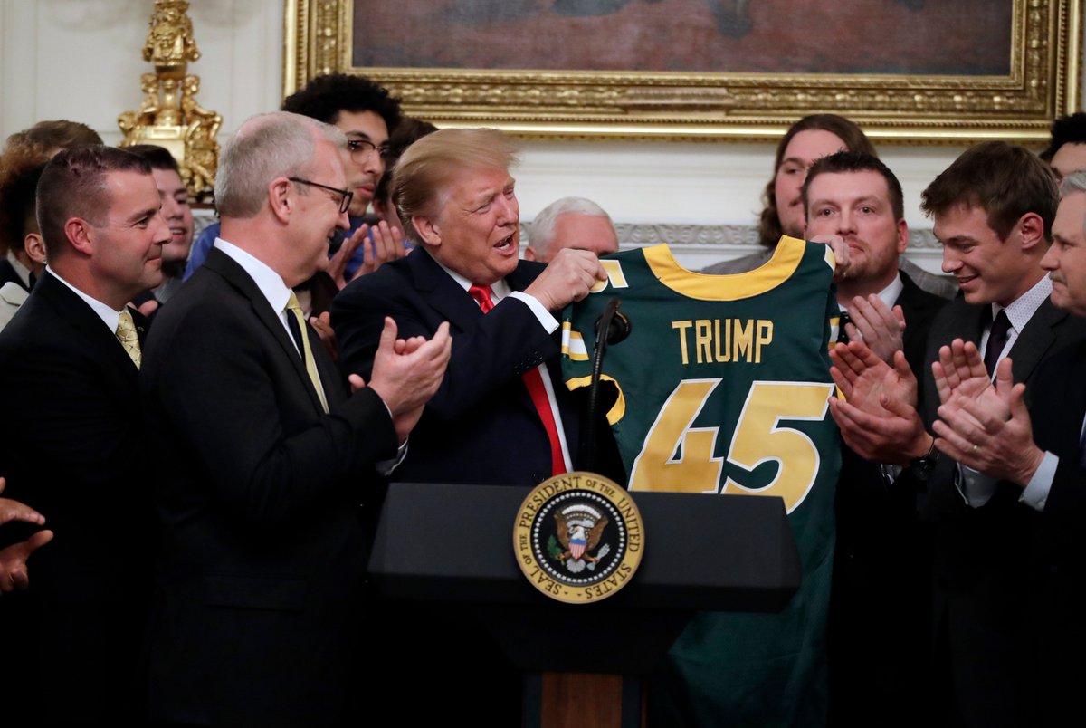 President Donald Trump gets a No. 45 North Dakota State jersey.
AP Photo by Carolyn Kaster.