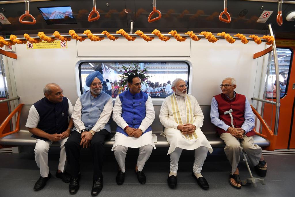 BJP4Odisha's tweet photo. PM @narendramodi taking a ride in Ahmedabad Metro alongwith other dignitaries after its inauguration at Vastral Gam Metro Station in Ahmedabad. https://t.co/95cOAdLLxa