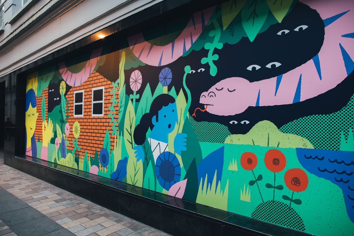 UsFolk_'s tweet image. We’re excited to be sharing a series of our large scale illustration projects with Belfast City Council this week! First up is Fountain Lane’s beautiful city-to-jungle scape by @CheeseNolan  📸 by @fillyc