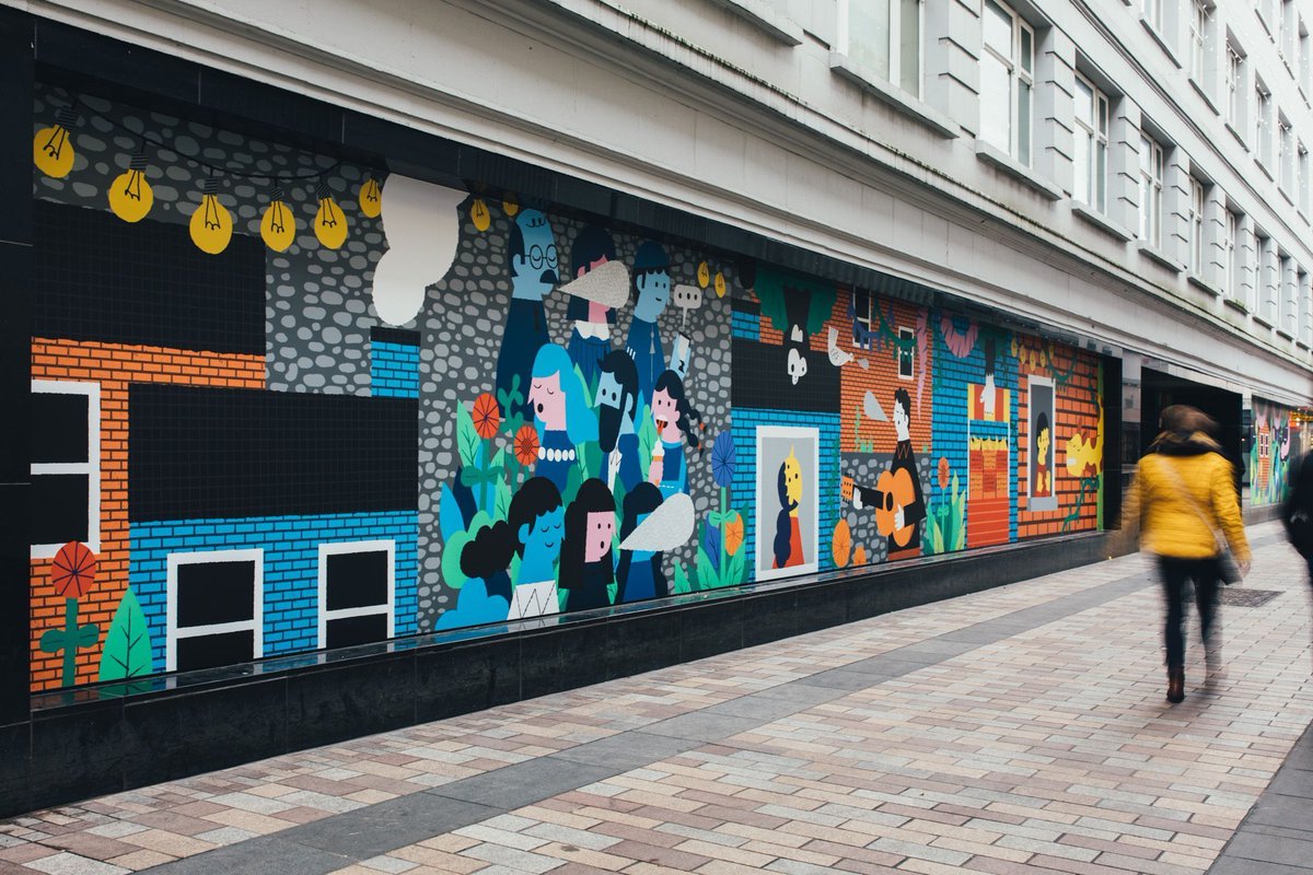 UsFolk_'s tweet image. We’re excited to be sharing a series of our large scale illustration projects with Belfast City Council this week! First up is Fountain Lane’s beautiful city-to-jungle scape by @CheeseNolan  📸 by @fillyc