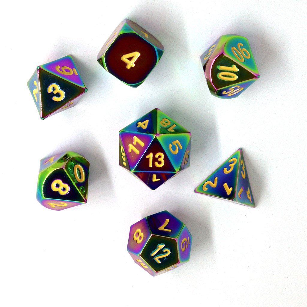 JakeWyrm's tweet photo. Now these are some good dice. Nice and heavy since they’re metal, and what a beautiful oil-slick coloring! (Not that oil spills are beautiful. They’re very bad.) 10/10 https://t.co/NanQ3AvSuw