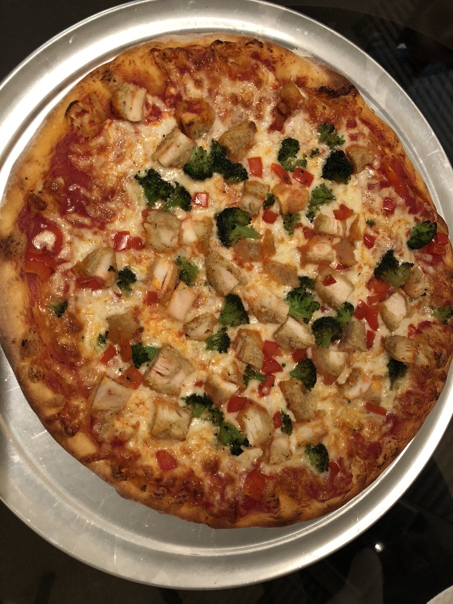 We love when customers email us photos of their personalized Pizzers! Thanks Maggie from Hicksville, NY for sharing with us this delicious creation complete with broccoli, breaded chicken &amp; peppers! #foodie #pizza #ilovepizza #pizzalife #foodiechats