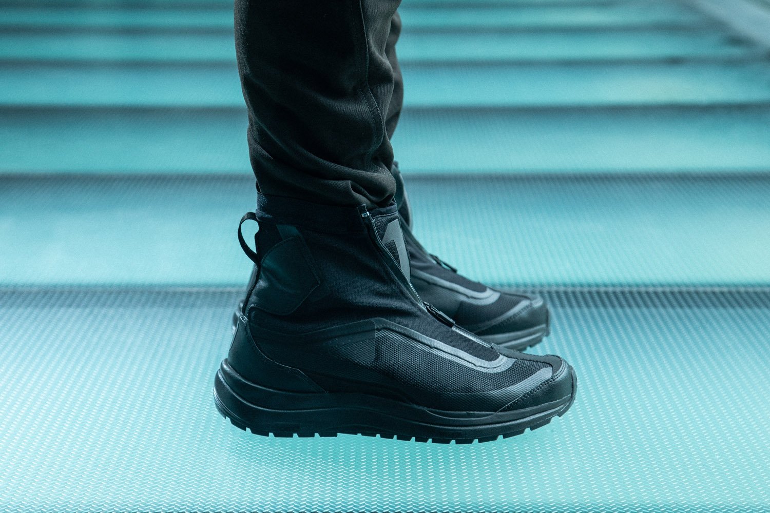 HBX on X Highlights The 11 by Boris Bidjan Saberi Salomon Bamba 2 Sneakers boast a knitted and coated fabric upper mesh front toe cap sectioned off by the center zipper a