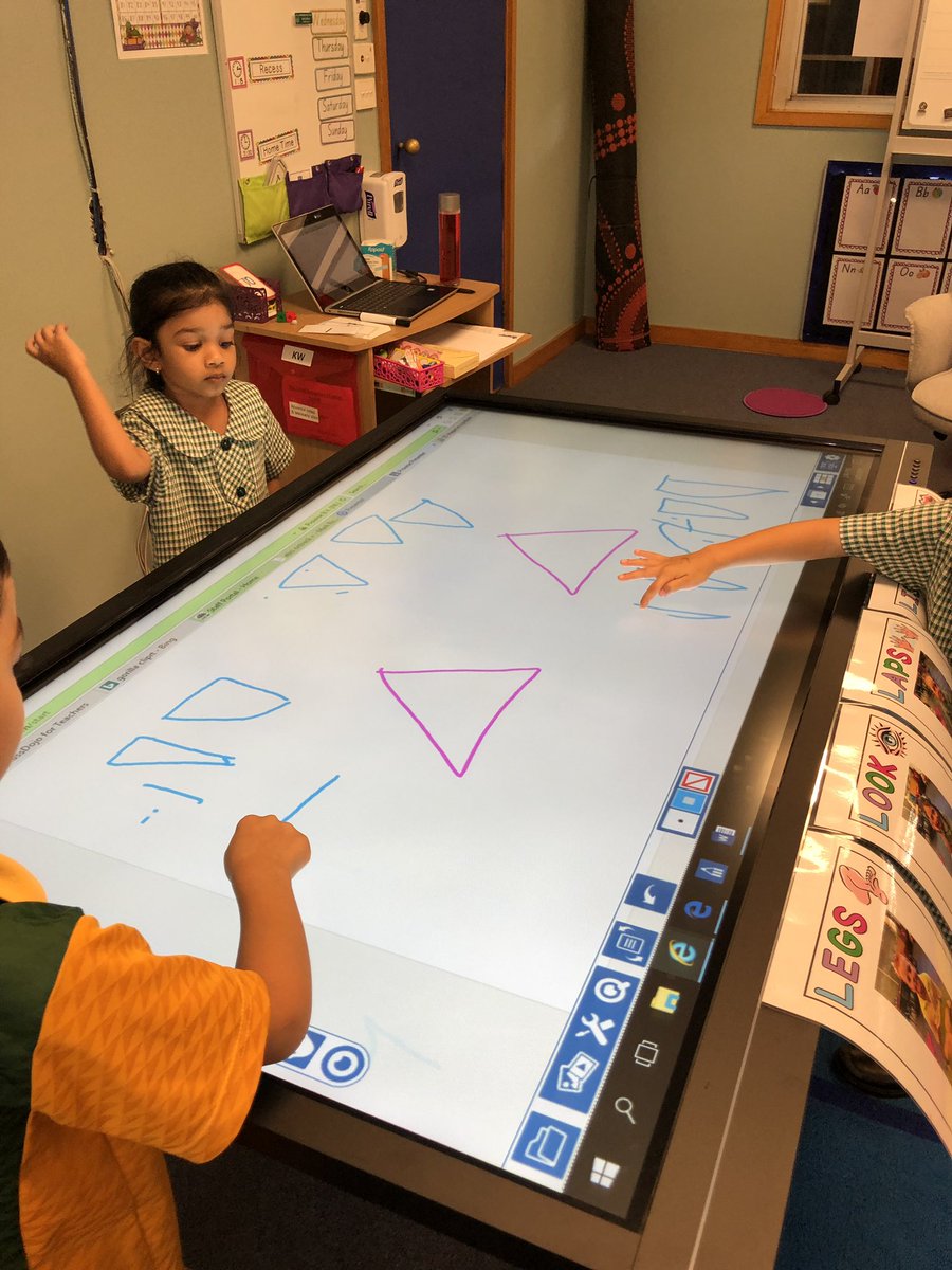 Ashwil__'s tweet photo. KW finding 2D shapes in a picture and learning to draw triangles. So much excitement when using the IWB! @Chipping_no_PS  @shelley_diamond https://t.co/EPgHN6yATd