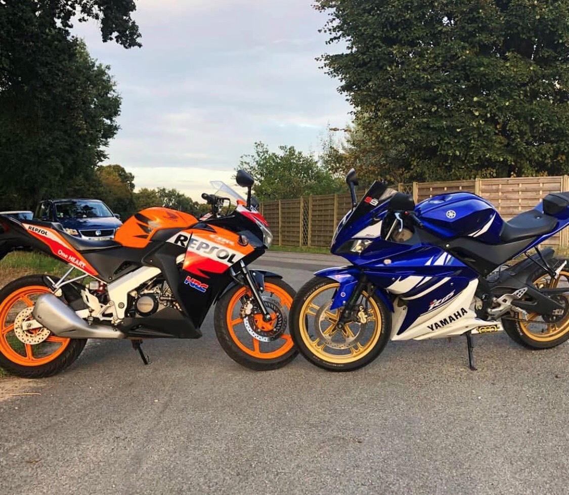 DucataB's tweet photo. Two titans Honda 🟠 and Yamaha 🔵, but which would end up in your garage? #Honda #YAMAHA https://t.co/qdjQkaPe6X