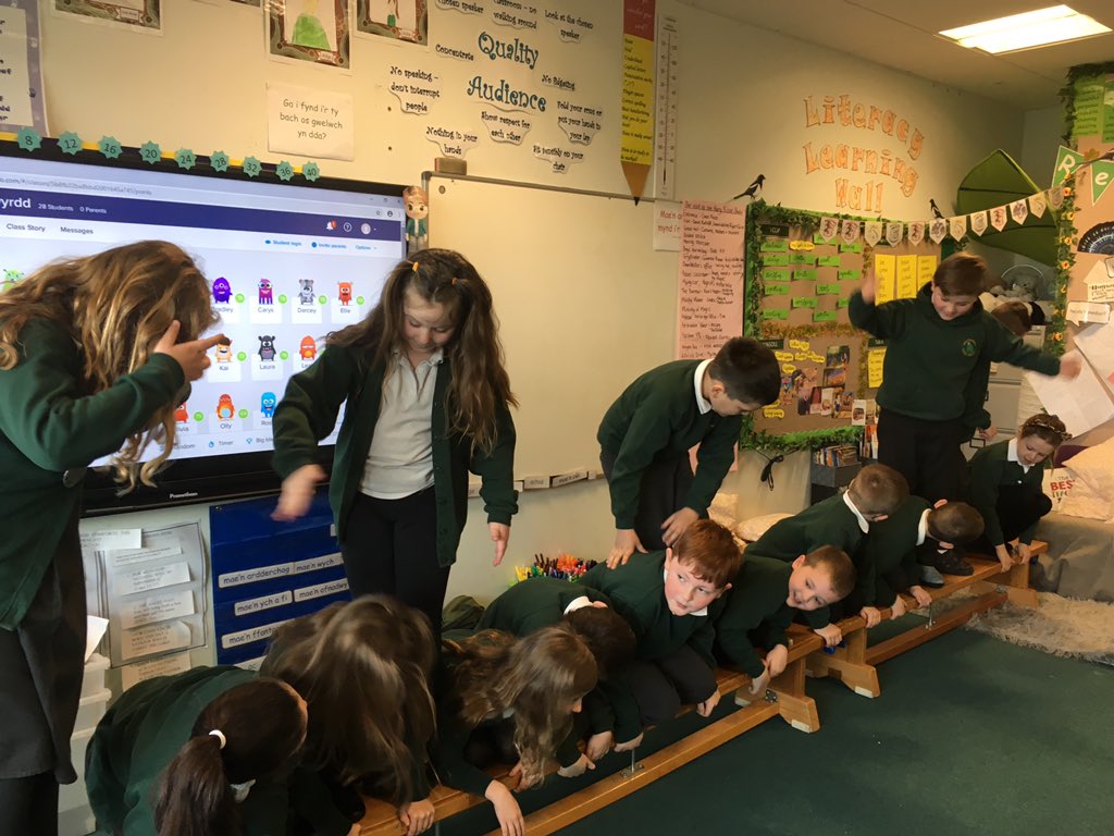wpsenfys's tweet photo. First activity of Collaborative Cariad Day complete, we really had to work together to put ourselves in height order on the bench. #WPSMetacognition #CollaborativeCariad https://t.co/r7nnuvsGKE