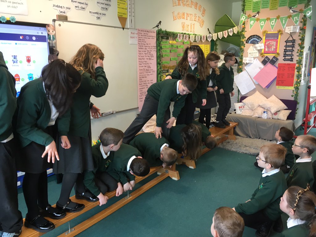 wpsenfys's tweet photo. First activity of Collaborative Cariad Day complete, we really had to work together to put ourselves in height order on the bench. #WPSMetacognition #CollaborativeCariad https://t.co/r7nnuvsGKE