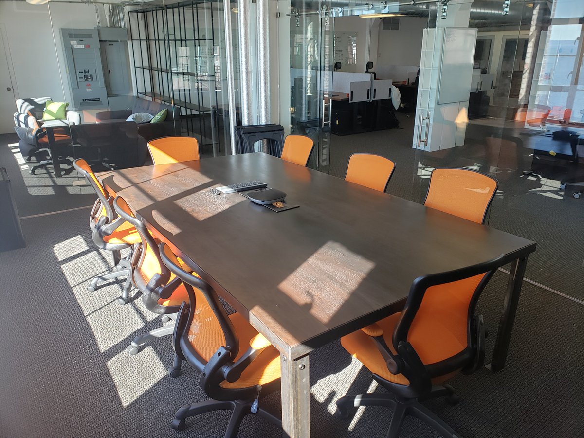 QuantConnect's tweet photo. Our Seattle HQ continues to feel more like home. Yesterday, we got our conference room set up. While it was quite an adventure getting the table inside, the end result is well worth it! #QuantCommunity #LifeAtQC https://t.co/jFwScF9UvG