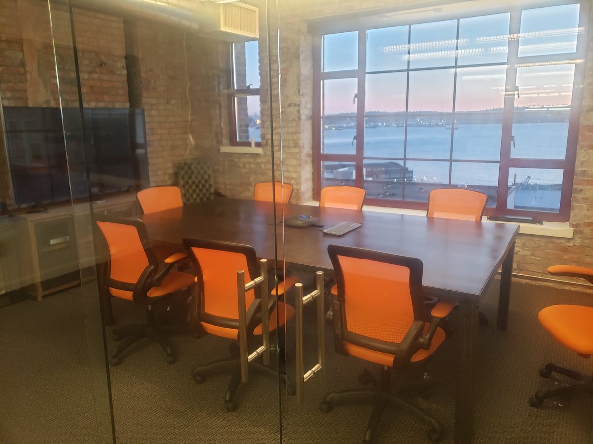 QuantConnect's tweet photo. Our Seattle HQ continues to feel more like home. Yesterday, we got our conference room set up. While it was quite an adventure getting the table inside, the end result is well worth it! #QuantCommunity #LifeAtQC https://t.co/jFwScF9UvG