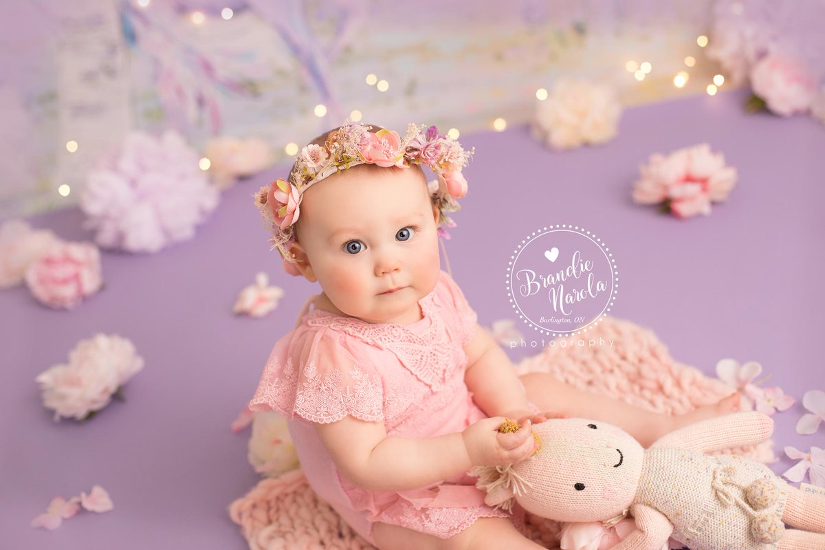 I cant believe its been 9 months since we captured this sweet baby girls newborn photos! We loved seeing this gorgeous family back in the studio and can't wait for her cake smash session <3
