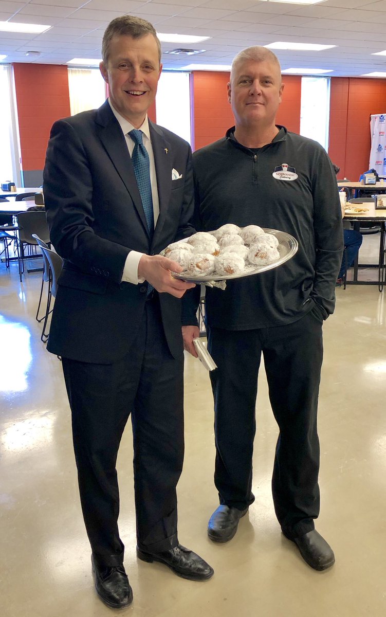 Passing out homemade Paczki  with Notre Dame President Tom Kruczek. We use him Mom’s recipe to make them!