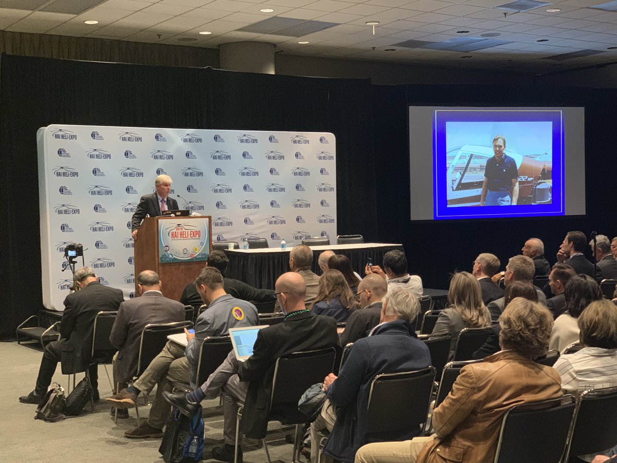 collectiveheli's tweet photo. Packed house in the @Robinson_Heli press conference. CEO Kurt Robinson just announced a Robinson built in cockpit video and voice recording system will be complete mid year for the R22,44 and R66. https://t.co/63iVOycIYO