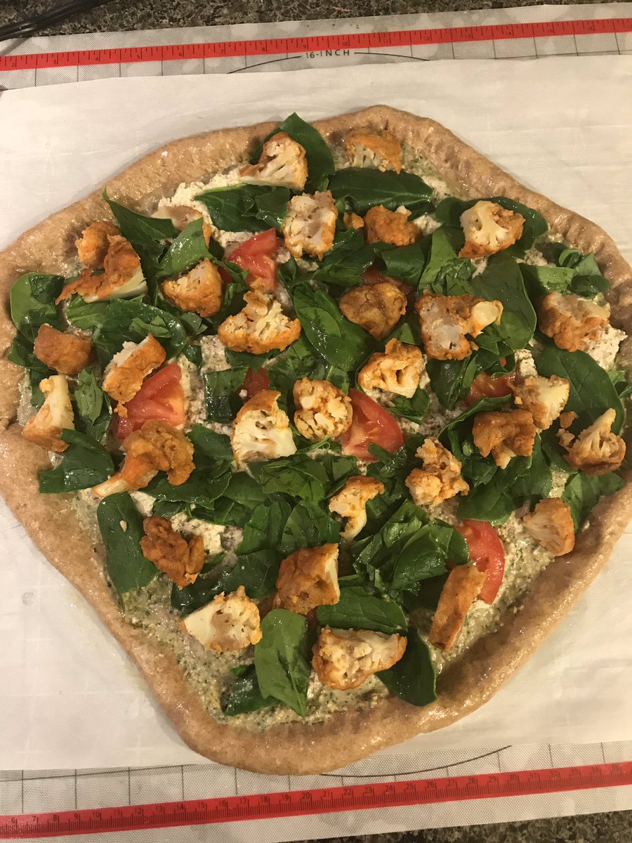 To my pizza lovers  I used the leftover buffalo cauliflower to make this pesto, almond ricotta, cauliflower, spinach and tomato pizza. I truly was winging the ricotta and it came out soooo good, vegan pizzs for the win