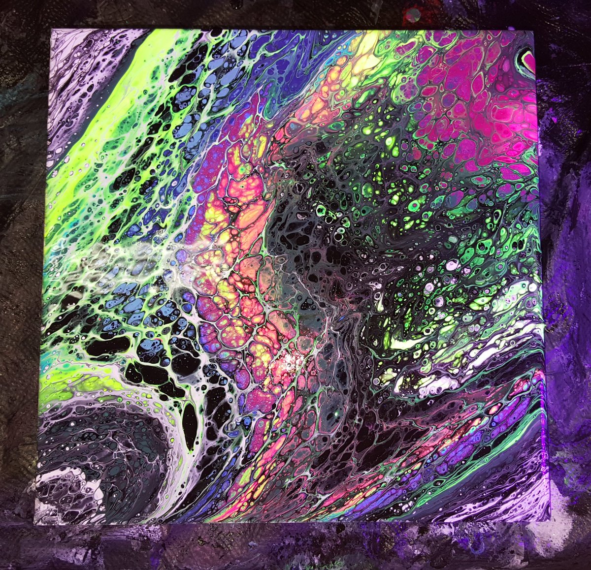 AriStone's tweet photo. A new #Blacklight #galaxy #PaintPour in process. 

#galaxypour #art by #AriStone https://t.co/jbd7E2c1lU