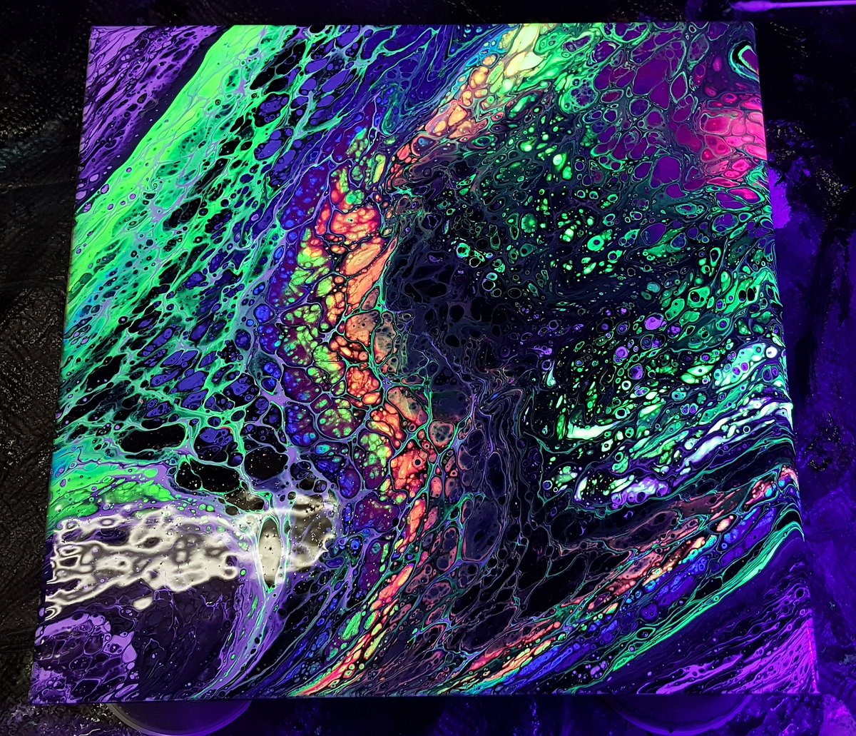 AriStone's tweet photo. A new #Blacklight #galaxy #PaintPour in process. 

#galaxypour #art by #AriStone https://t.co/jbd7E2c1lU
