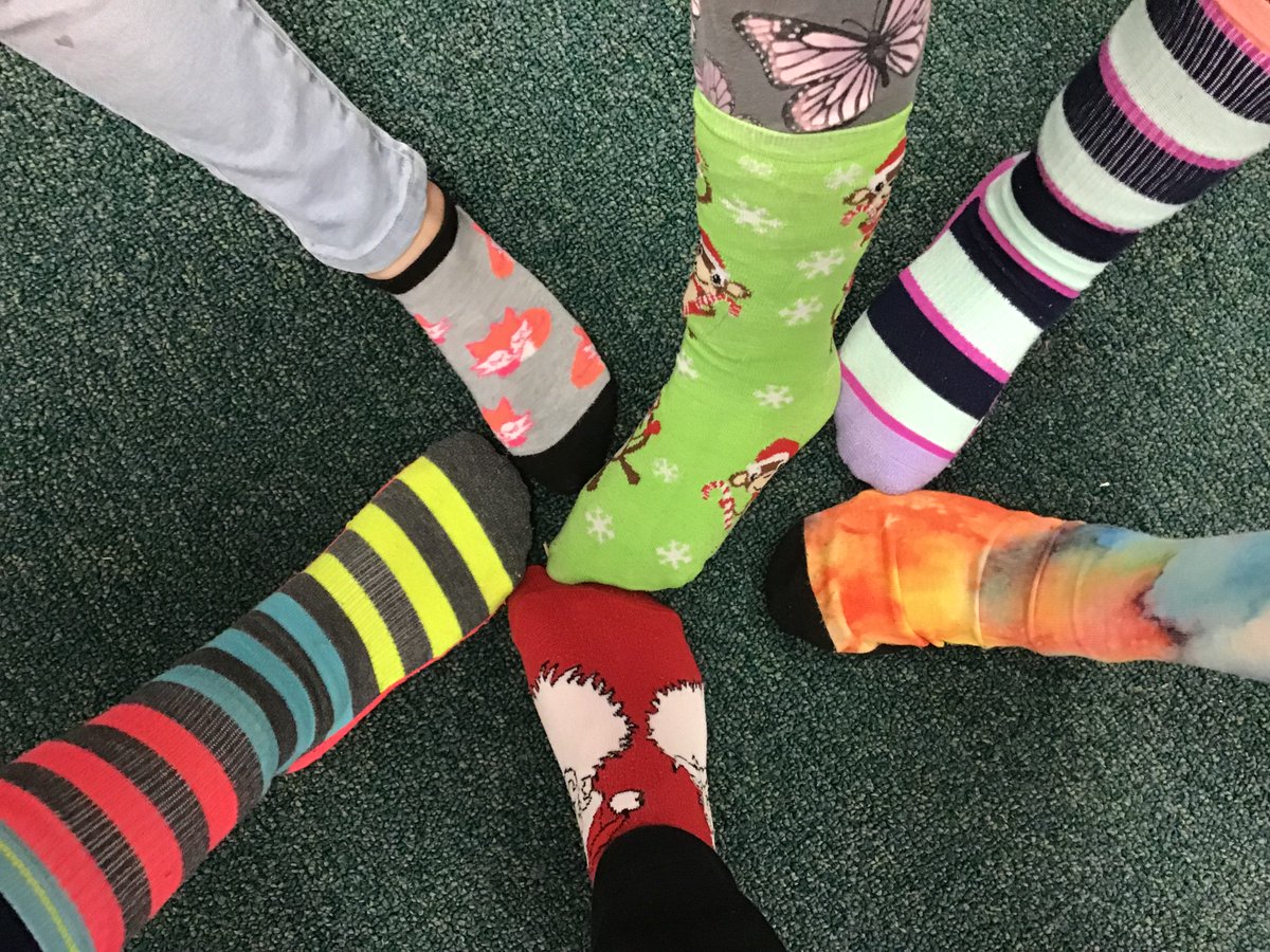 Reading1st's tweet photo. Our silly/mismatched socks for Fox in Socks Day! @MeadowSchool #KidsDeserveIt https://t.co/XsGqzT2k95
