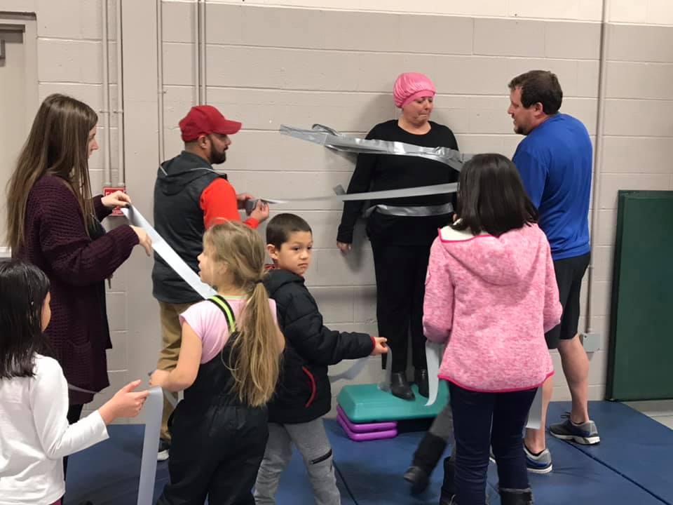 Check it out!

Larson Heights Elementary students sold over $8,000 worth of chocolate during their last PTSO fundraiser, and as an award taped Mrs.Schotzko to the wall! Awesome job students and what a fun way to celebrate!