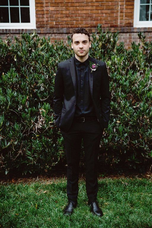 taylor york in a black suit, you're welcome