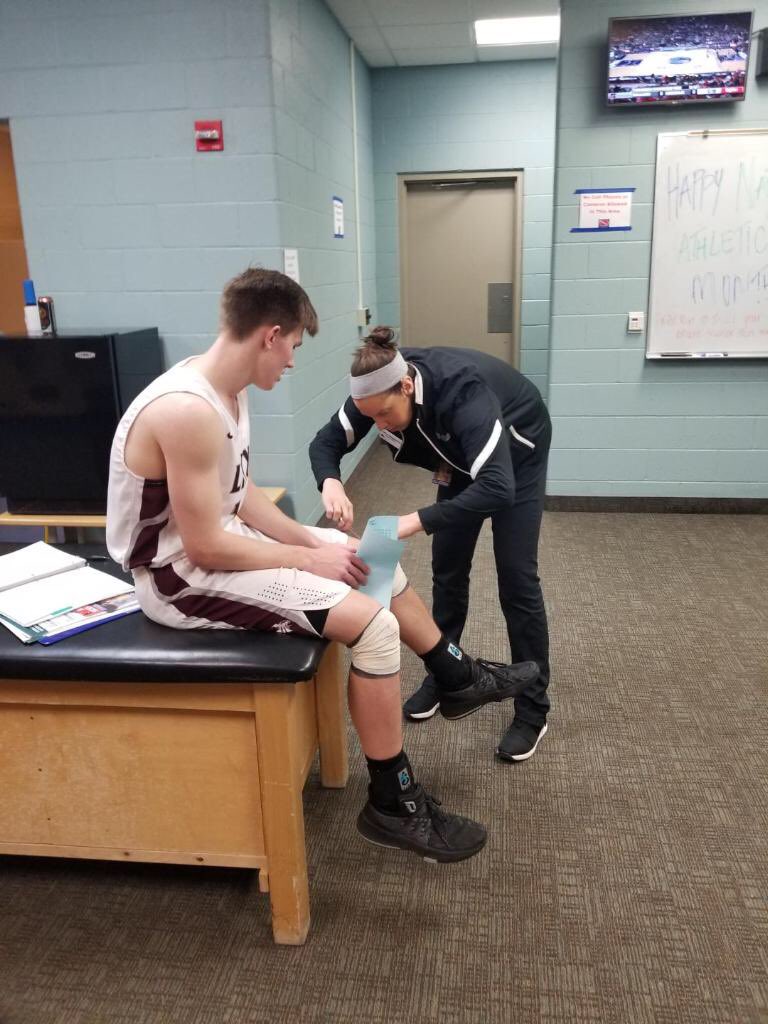 AndieOlson21's tweet photo. LOVE when worlds collide!! Told Former player @alklapperichATC (working State BB) to find @Coach_Griffith & North Linn team. Wanted them to meet but when TWO players were injured she was there to save the day! Thanks Allison for all you did & continue to do!! 😍 #SmallWorld https://t.co/vAbhPghEvH