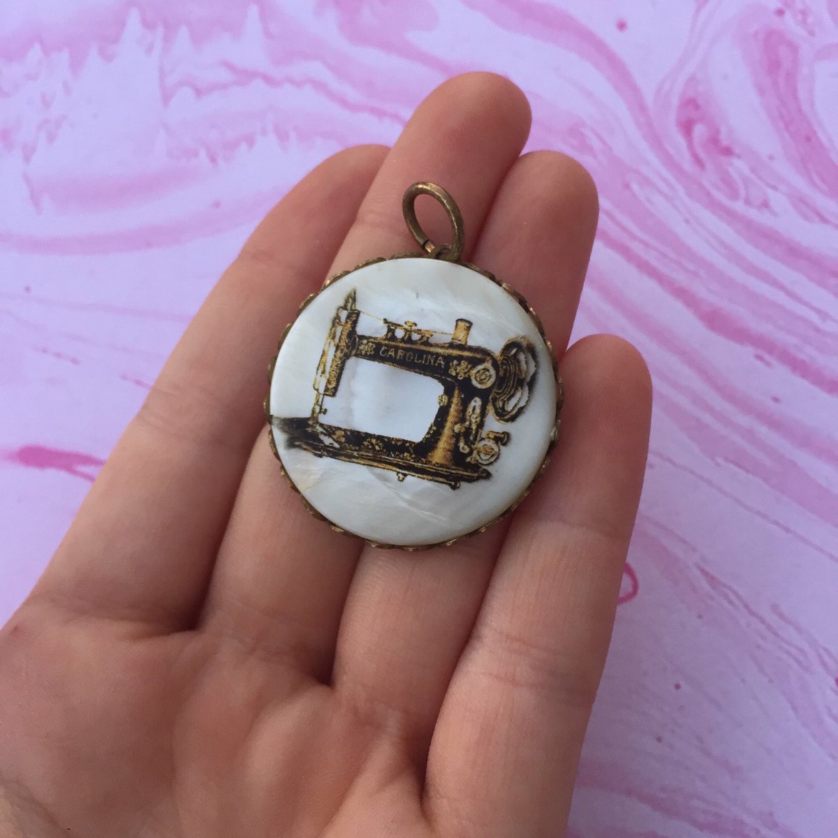 Excited to share the latest addition to my #etsy shop: Vintage Sewing Machine Pendant Pearlescent Background Carolina Sewing Machine Gold Toned Metal

 #jewelry #sewingmachine #vintagesewing #vintagependant #carolinasewing #sewingpendant #machinependant etsy.me/2SNn3NY