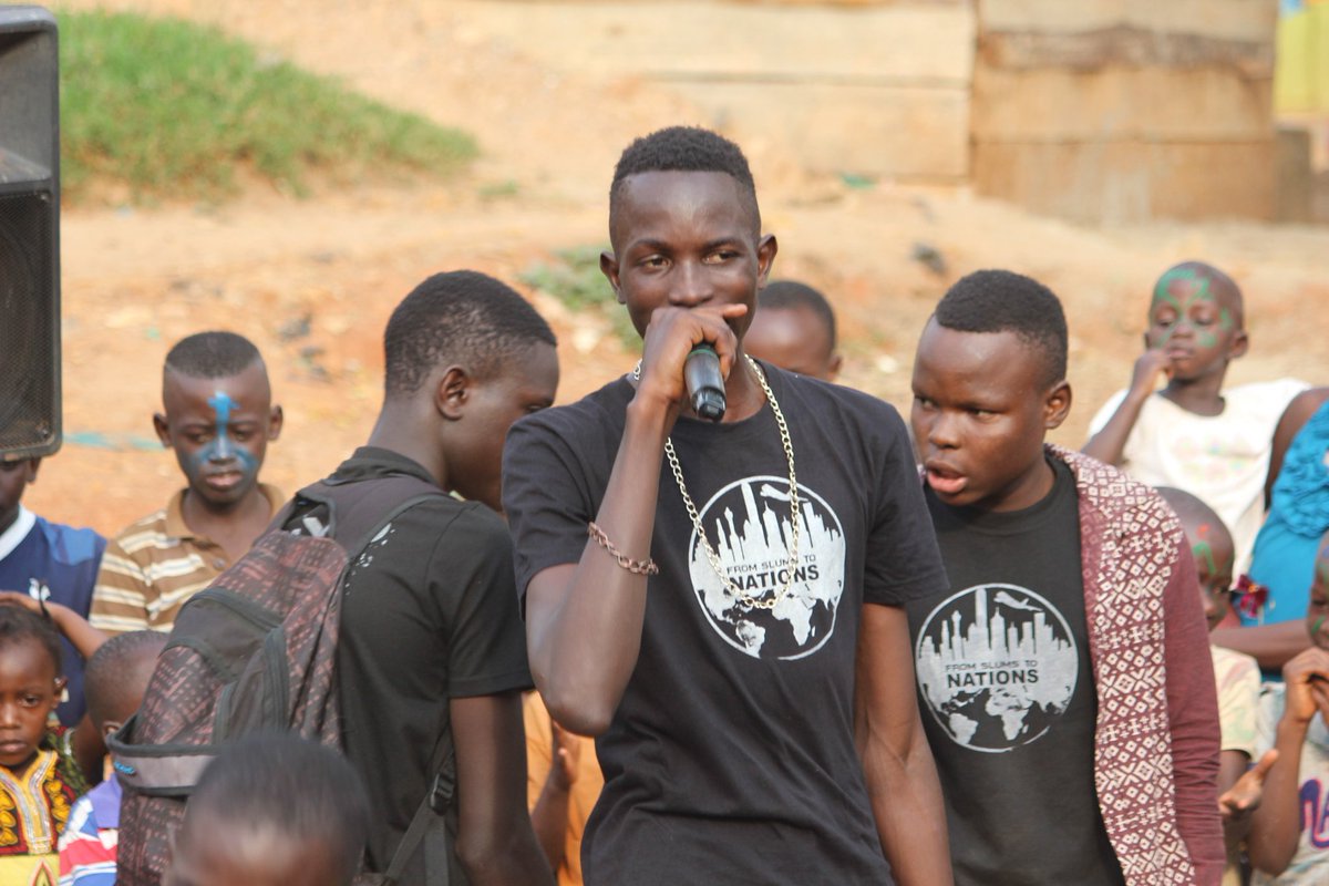 HolystreetO's tweet photo. Every journey starts with a step,  thanks to God for @Zack (with microphone) one of the children broght up from our ministry now he is doing great works. Last year he  finalized his high school, next year he'll be joining university. Pray for God's provision.  ... https://t.co/SuAwuOzG5x