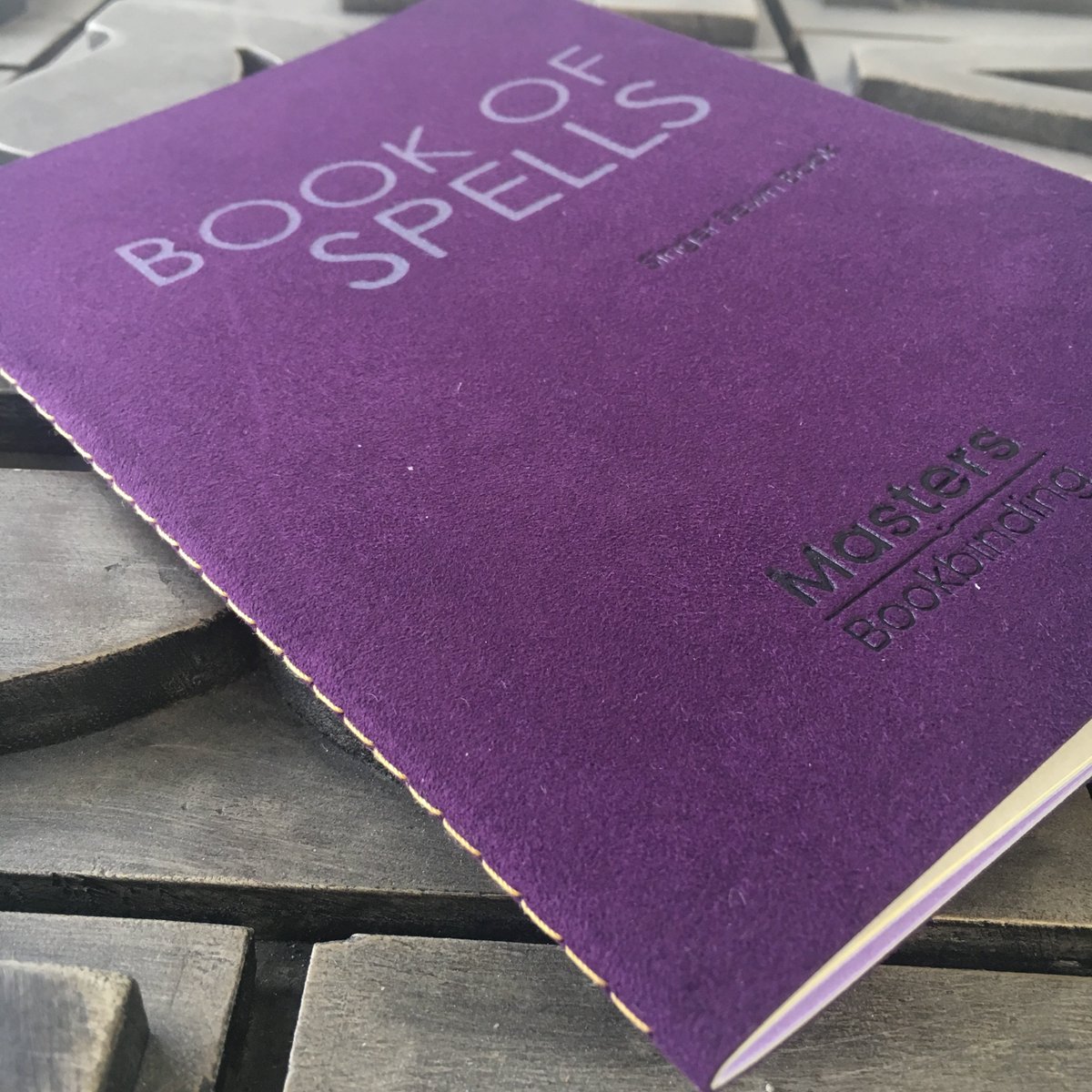 PureprintGroup's tweet image. Another great sample in the @MasterBookBind Box of Magic – singer sewing with @WinterandCoUK Kamosho a beautiful tactile mock suede material #bookcloth #creativeprint #PureprintLibrary