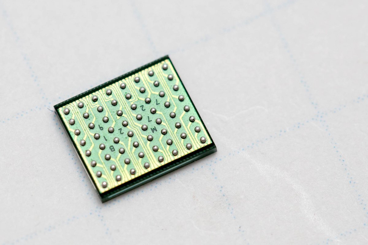 Where do you put the part number if the topside is all glass? 

The underside of course! Just fit the part numbers between the balls and the traces. 🤪