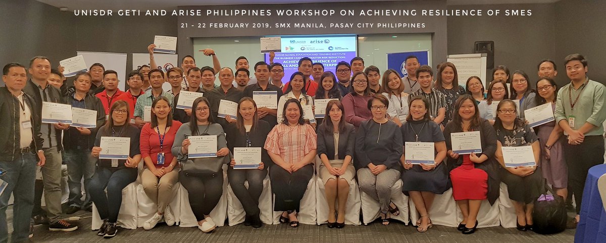 TurleyPearl's tweet photo. ...and we are done w/ #UNISDR GETI  Workshop on Achieving Resilience of #SMEs. Proud pax show off their certs while posing for souvenir pic w/ Ms. Ana Thorlund of #UNISDR, #ARISEPhilippines members, and #SMSupermalls employees headed by Engr. Liza Silerio. https://t.co/wEI56QqvUc
