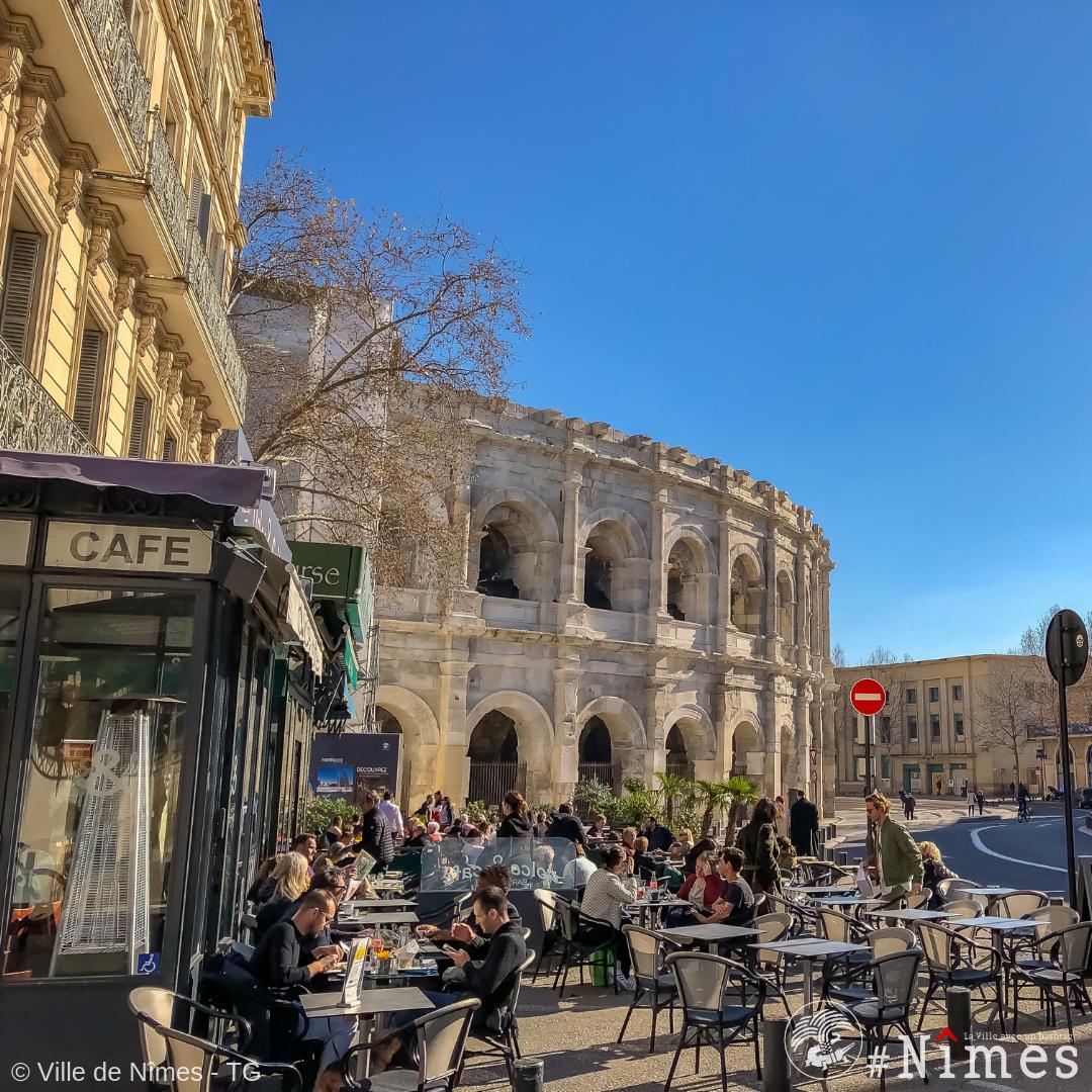 nimes's tweet photo. 😎☀️✅To do list : se faire une terrasse à #Nîmes dans la douceur de février 🥰 Les rayons du soleil, le ciel bleu, les arènes @ArenesdeNimes...🐊💚🌴
#VilledeNîmes #VivreNîmes https://t.co/8vz96rUmn3
