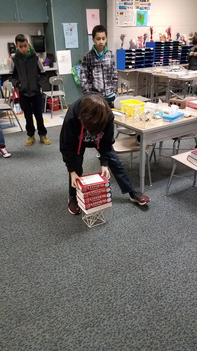 Students are using the Warren and Pratt design to construct sound wooden bridges during STEM electives <a href="/eastcarymiddle/">East Cary Magnet Middle School</a>. <a href="/shandua_ellis/">Shandua Ellis</a> <a href="/ShafieSahar/">Sahar El Shafie</a>