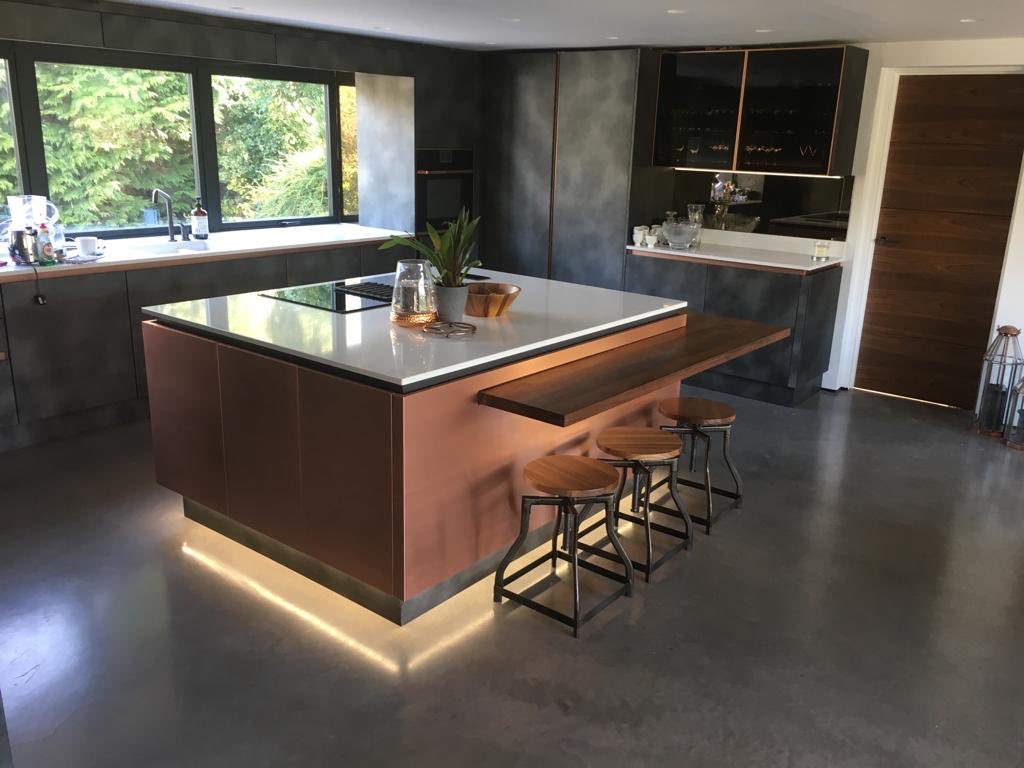 mpmengineering's tweet photo. Revisiting a job today that we completed last year, and boy are we glad we did because this #copper clad #island #worktop still looks fantastic 👌🏼a really nice compliment to these #concrete #effect #kitchen #cabinet #doors #kitchendesign #kitchenisland #design #copperworktops https://t.co/1MSty4p0gL