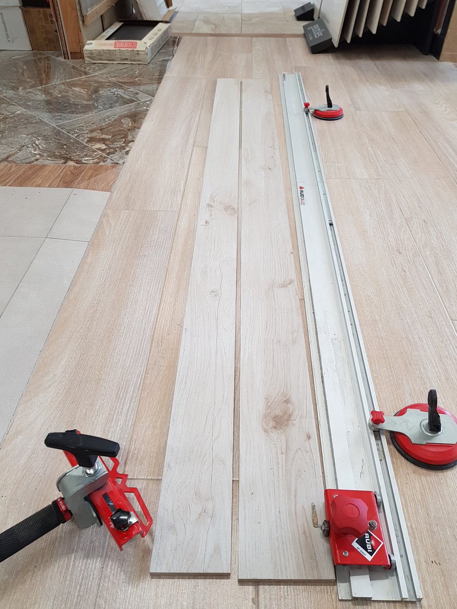 RichardRubi_IRE's tweet photo. Cutting 2100mm long wood-look porcelain today 10mm think with the Rubi slimline cutter and heavy breaker/separator  #Ernetiles #Cavan https://t.co/VRnYf5xPrE