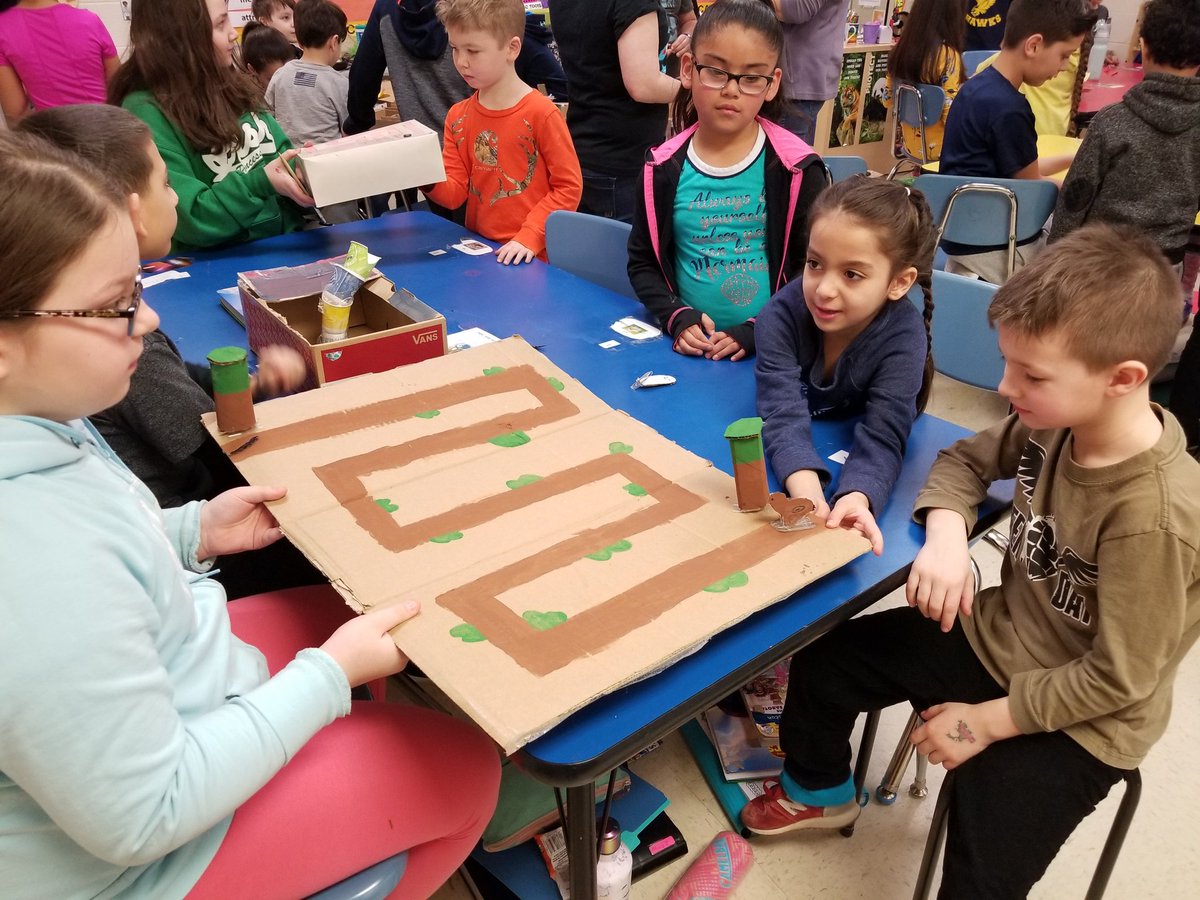 Harnewhawk's tweet photo. Ms. Sinsheimer's 4th grade students created magnet-based games during their Science class! They had Mrs. Santoro's 1st graders test them out! #harnewcares https://t.co/F7Gf3ygB40