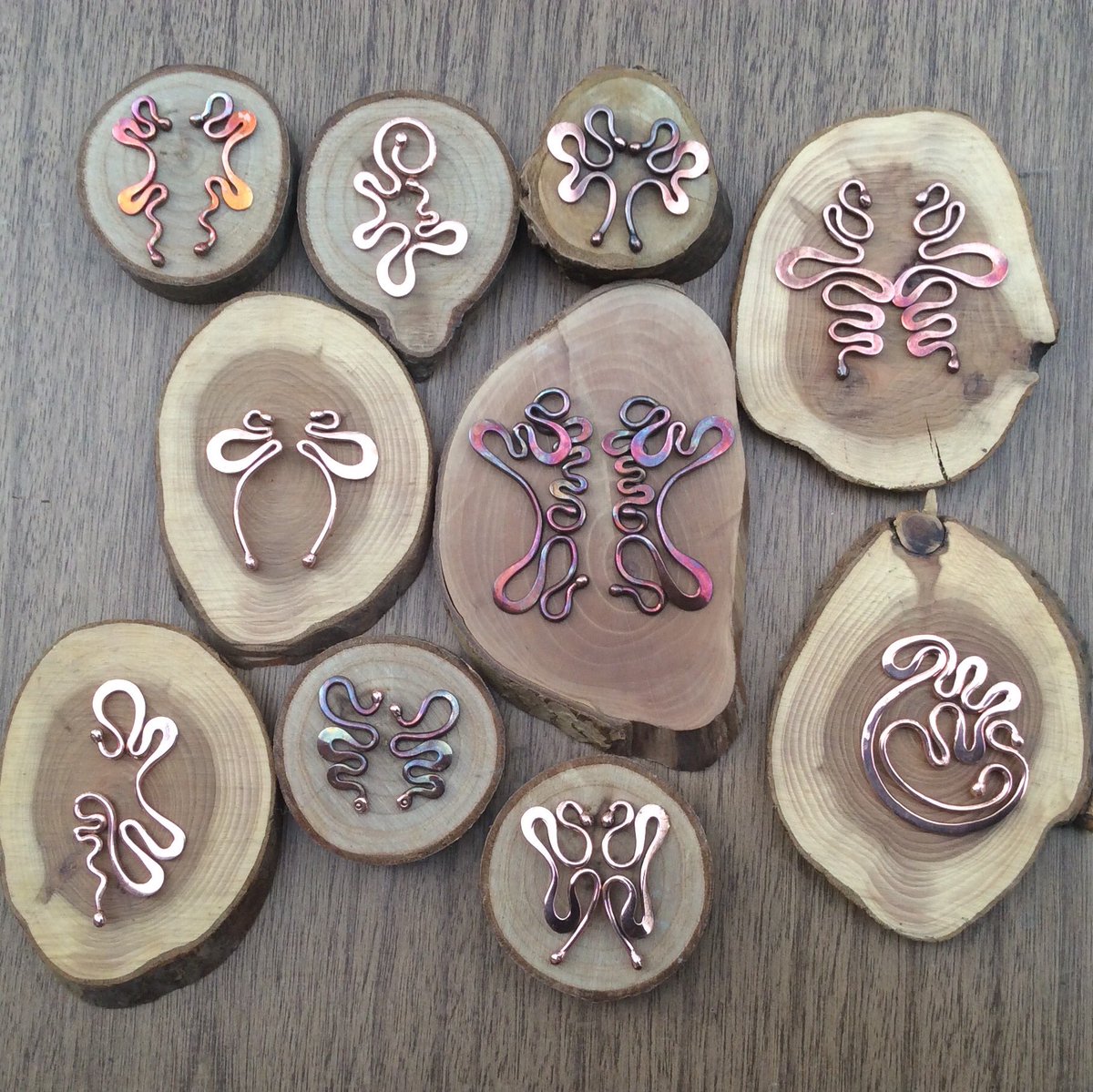 ChristinasWork's tweet photo. So here are my efforts making #copper #jewellery with #earnings, #pendants and #rings, pictured without ear hooks they will be #silver once added. I'm experimenting with different finishes and #patinas for the copper. I will also be making similar in silver in the coming weeks. https://t.co/dNRl0Sk586
