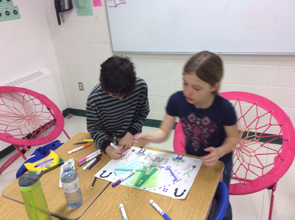 LaPorte_EES's tweet photo. Working on creating our #basegroup #symbols and #slogans. Students worked hard together to create their masterpiece! #collaboration #hardwork #teamwork https://t.co/doGJUKdSkK