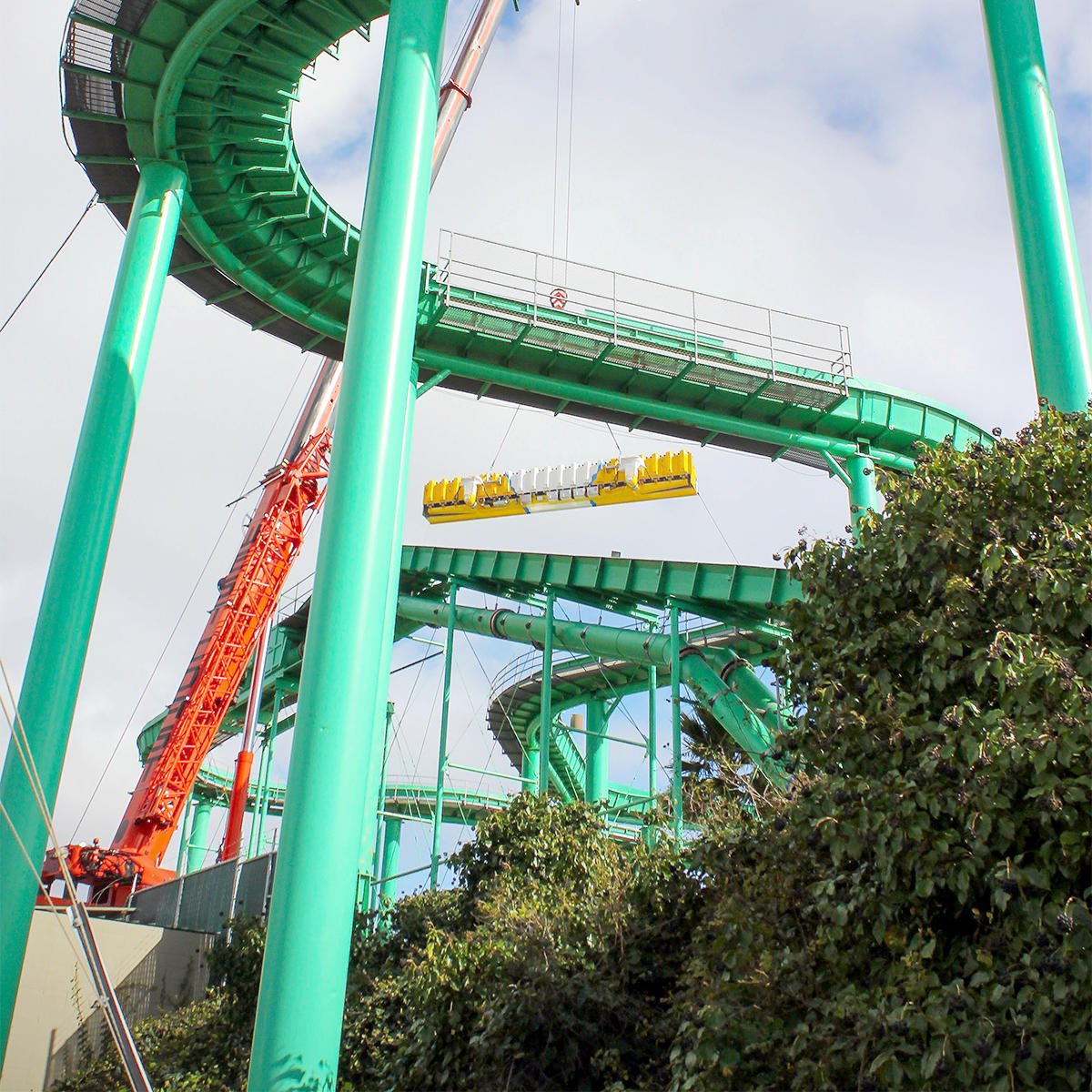Our NEW Crazy Surf ride caught some major air before droppin' into its spot  under Logger's Revenge! Boardwalk Maintenance team sure has some impressive  navigating skills. Can't wait to try it out, image size:1200x1200