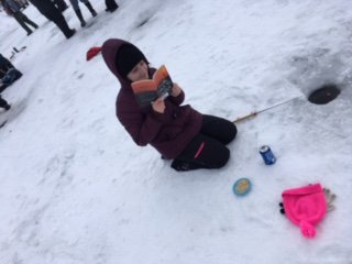 Grade 6 is ice fishing today...with a book you're never bored when the fish aren't biting.
