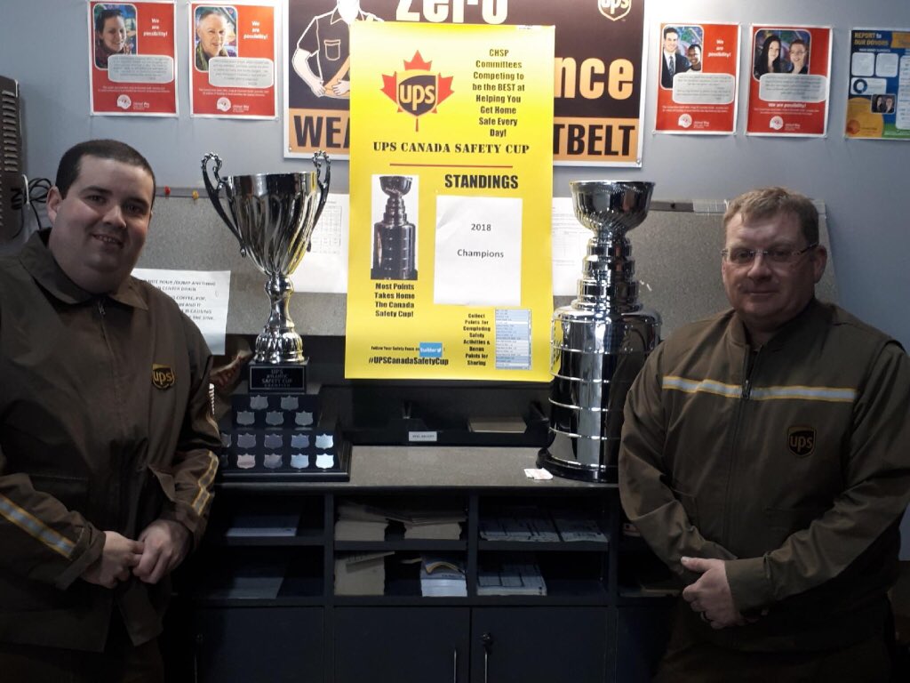 Myself and committee member Steve Noseworthy with our two safety cups. Our center engraved in spot one of the UPS Canada cup and Atlantic cup.