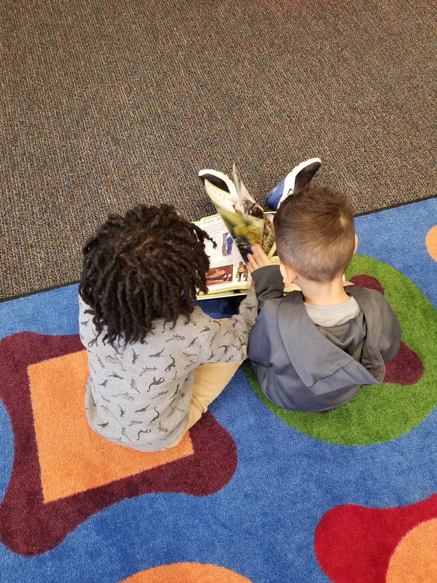 HuhmanMs's tweet image. What a sweet gesture...sharing a book with his friend who didn't return his book and couldn't check out a new one. #creteach #CREreads