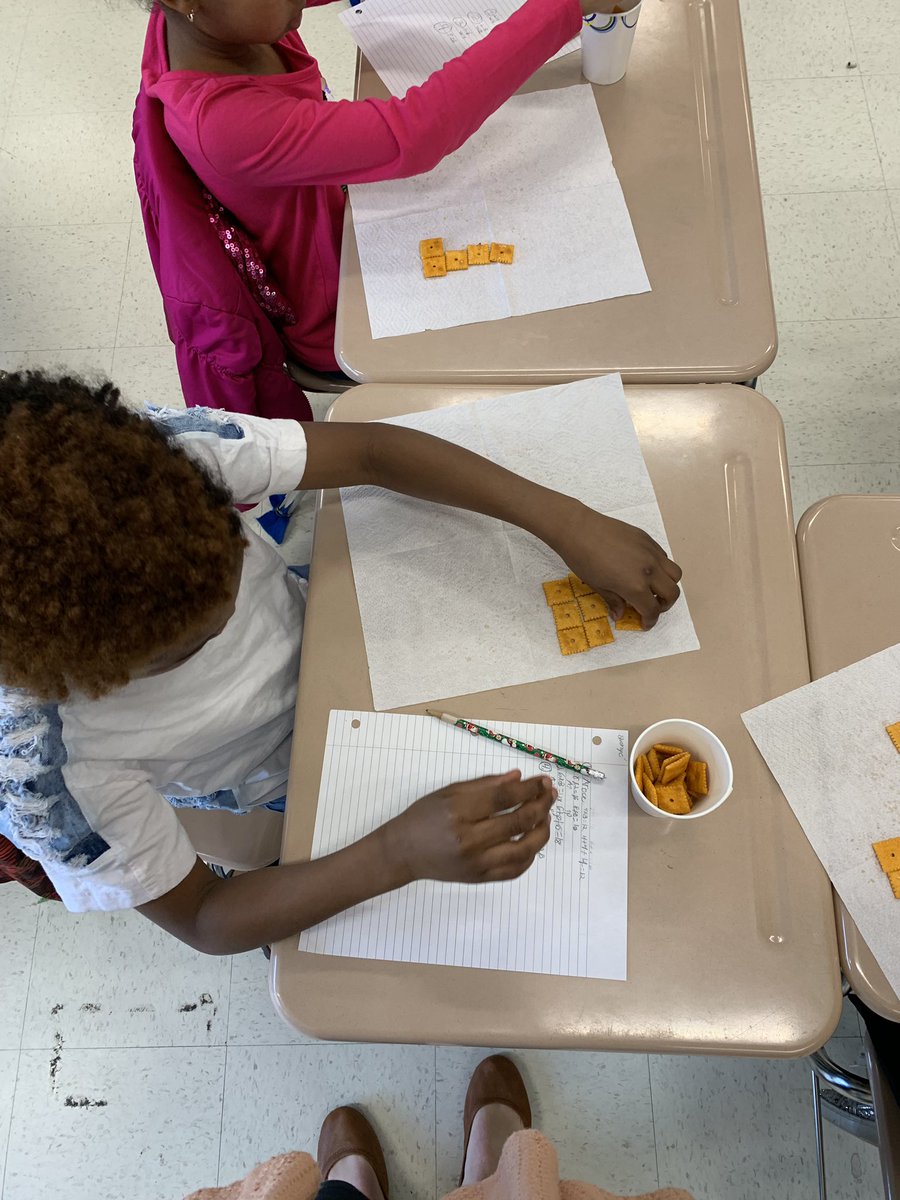 mrsfoleysclass's tweet photo. The area of a cheese it is 1 sq inch. We are still guessing the perimeter because they tasted too good to measure! #perimeter #area #weareDPS https://t.co/Ztj4vPCCVB