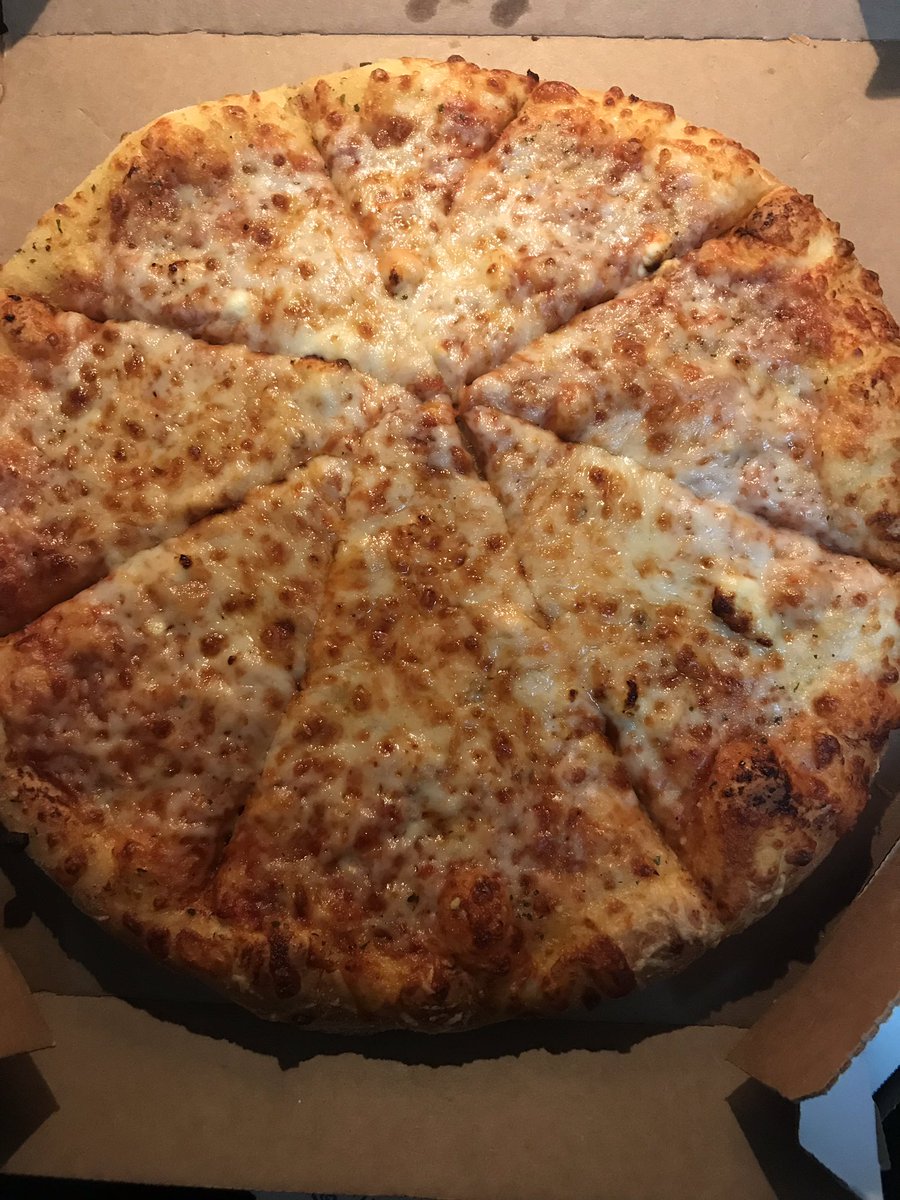 Breezlyn's tweet photo. @dominos Your Arlington Tx Domino’s is really dropping the ball. 2nd time we have gotten a weirdly cut pizza and dry crust! https://t.co/rZfvZvmZRF