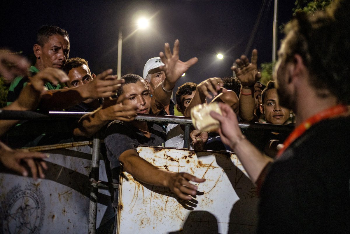 This photo of our <a href="/WCKitchen/">World Central Kitchen</a> team distributing sandwiches to hungry Venezuelans on the Francisco Bridge in Cúcuta says more than my words can describe... #ChefsForVenezuela #ChefsForThePeople