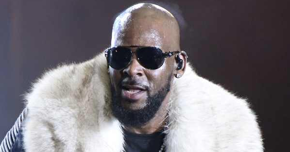 R. Kelly is turning himself in to the authorities just hours after being ch...