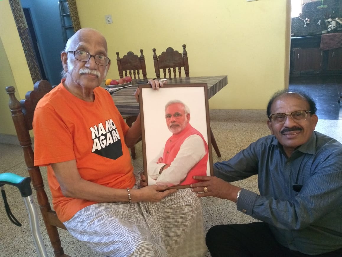 hayavadan3's tweet photo. Haven't seen a bigger fan of Mr Modi sir than my grandfather. The t shirt and the photo frame says it all !  He is looking forward to meet you sir  @narendramodi @AmitShah @BJP4India @BJP4Karnataka @BJP4Gujarat #bjp #AmitShah #ModiOnceMore #Modi4NewIndia #ModiFor2019 #modi5years https://t.co/Qkg2fmBByQ