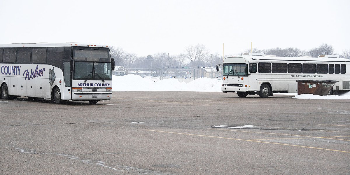 HuskerlandBob's tweet photo. Waiting for the weather to turn I am reminded why these district finals are so much fun. Where else ya gonna see these buses together? #nebpreps @FCSacredHeart #ArthurCountyWolves  @nsaahome https://t.co/gQ0Xs42OeM